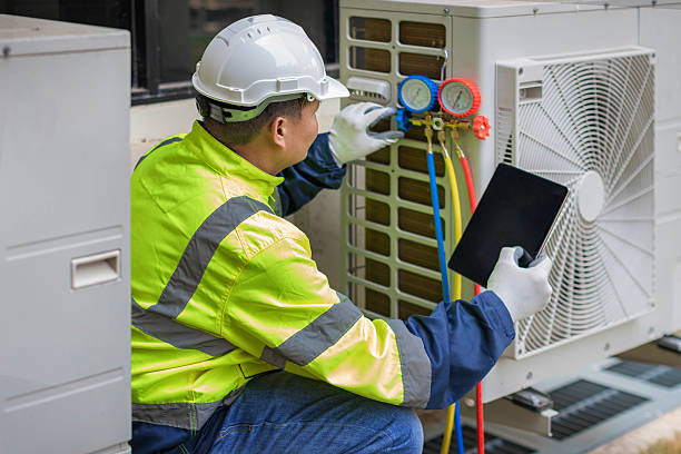 Professional Ac Installation technician working in Hales Corners, WI